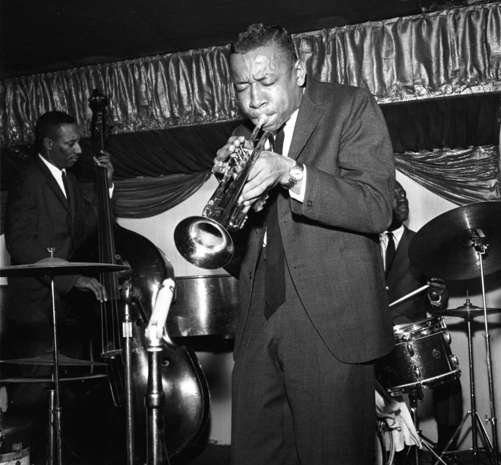 Black and white photograph of Art Blakey and the Jazz Messengers playing live at the Birdland, New York. April 2, 1959. From left: Jymie Merritt, Lee Morgan, Art Blakey.