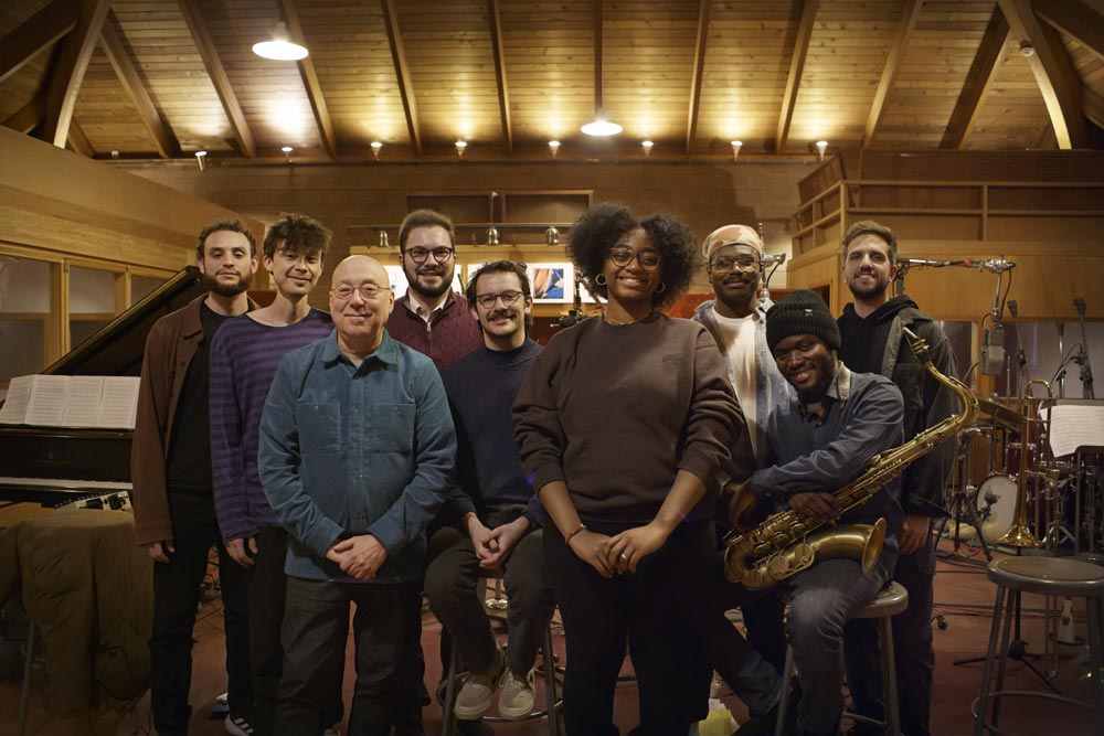 Samara Joy and her band pose for a group picture at Van Gelder Studio.