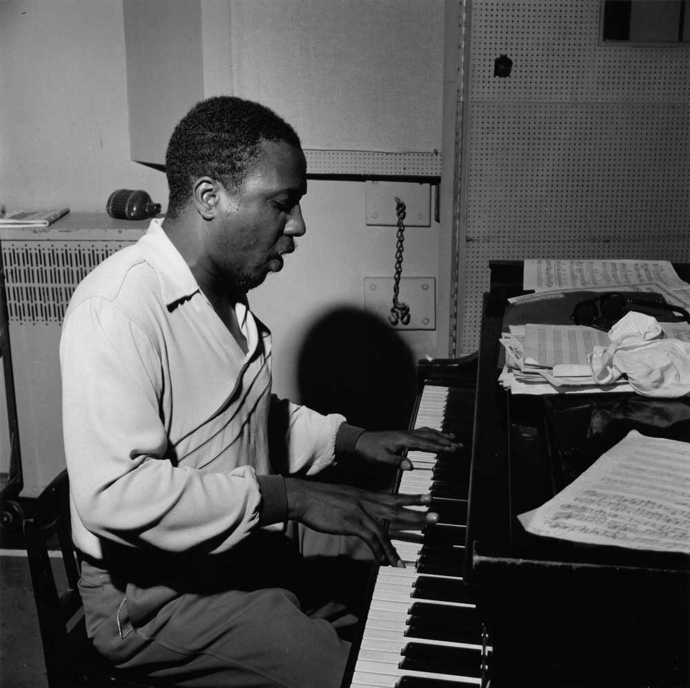 Black and white photograph of Jazz Pianist Thelonious Monk by Francis Wolff.